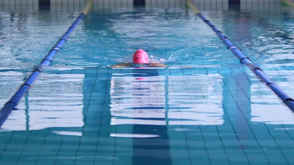 Swimmer training in a swimming pool