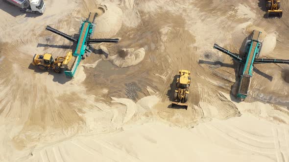 Aerial view of the sand quarry with heavy equipment