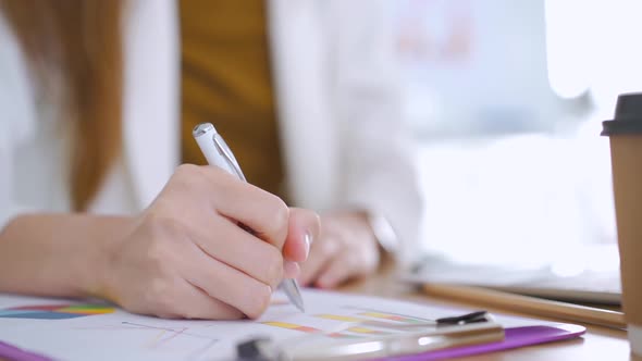 Close up business woman hand working 