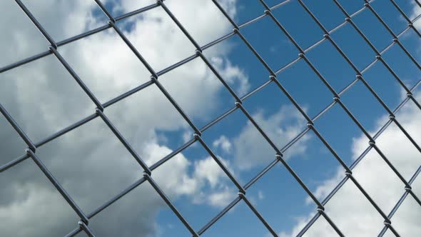 Chain Link Fence and Skyline Timelapse View From Jail Prison Restricted Area