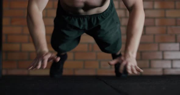 Athletic Man in Gym, Man Performs Explosive Pushups, Clapping Push in Slow Motion, Crossfit