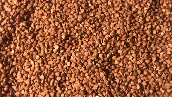 Buckwheat background. Useful properties of buckwheat.