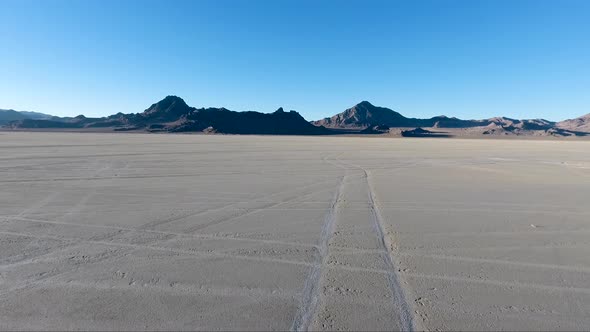 Flying over the Bonneville Salt Flats in Northwestern Utah reveal white salt and tire tracks.