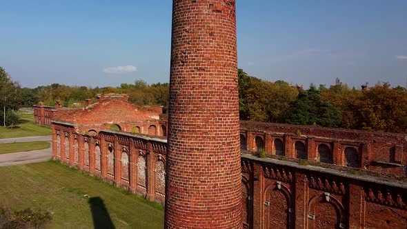 Aerial view red brick tower and former russian tsar army gymnastics hall in Karosta, used for gymnas