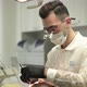 Slow motion of a dentist working in a dental clinic - VideoHive Item for Sale