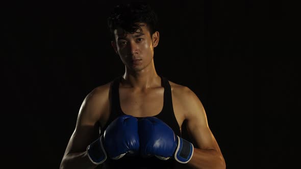 Asian Male Athlete Boxing Ready To Fight