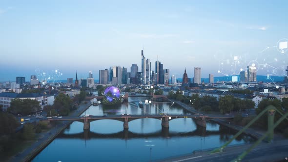 Backwards Fly Above River Flowing Through City at Dusk