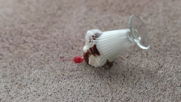 Ice cream sundae spilling on carpet in slow motion; shot on Phantom Flex 4K at 1000 fps