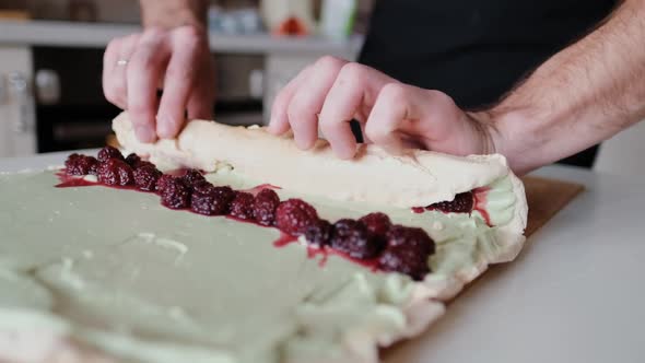 Roll Up Meringue Roll with Cheese Pistachio Cream and Fresh Berries