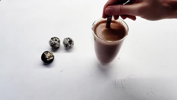 Person Hand Stirring Cup Hot Chocolate