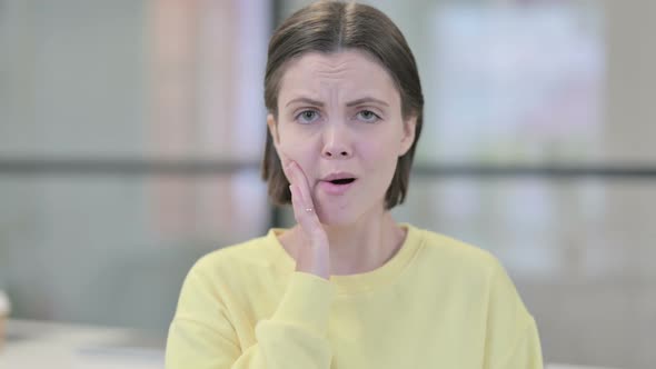 Portrait of Sick Young Woman Having Toothache