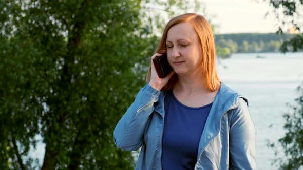Middle-aged Woman Talking on the Phone