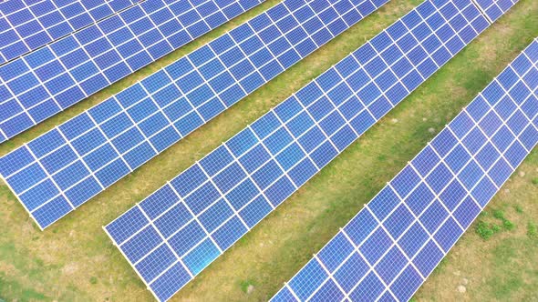 Closeup of surface of blue photovoltaic solar panels for producing clean ecological electricity. Pro