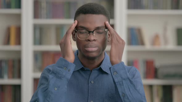 Young African Man Having Headache