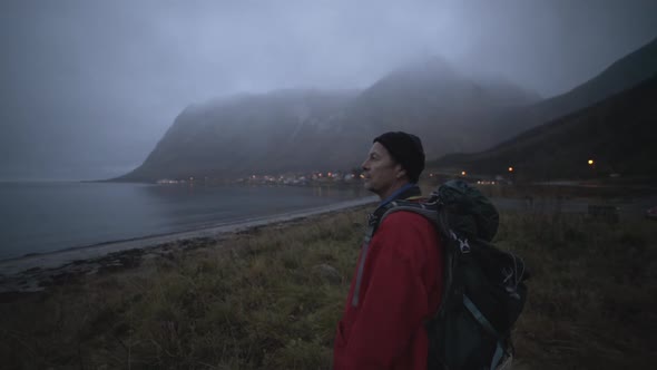 Hiker At Misty Fjord With Mountains