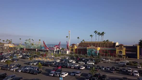 Fun Park rides fall tower at the beach Wonderful aerial view flight panorama overview drone footage