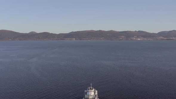 Norwegian Shuttle Ferry Crossing a Fjord in the Morning