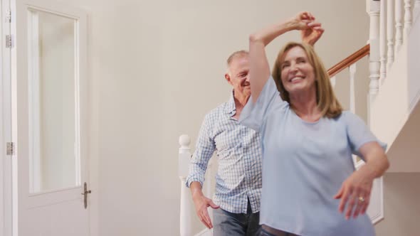 Senior Caucasian couple spending time at home together