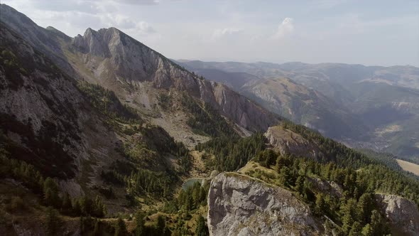 Approaching Aerial of Rugova Mountains and Lake in Kosovo