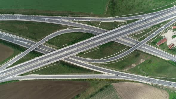 Aerial view of highway and overpass. Road junction, highway intersection top view.