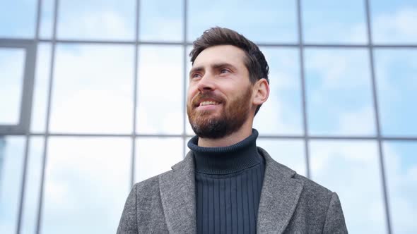 Face Portrait of Successful Businessman Stand Outdoors on City Business Center