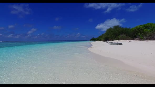 Aerial above nature of exotic shore beach trip by clear lagoon and white sand background of a daytri