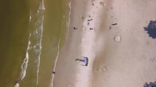 Baltic Sea beach aerial shot. Beautiful, secluded beach on Baltic Sea coast. Flying over the beach,