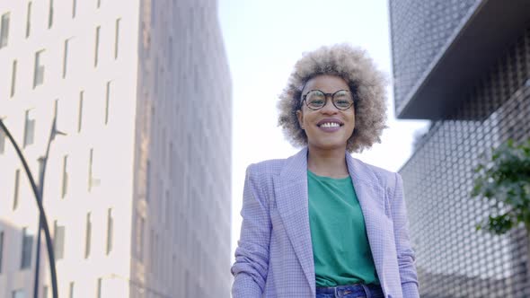 Portrait of Black Business Female Professional Leader with Afro Blond Hair