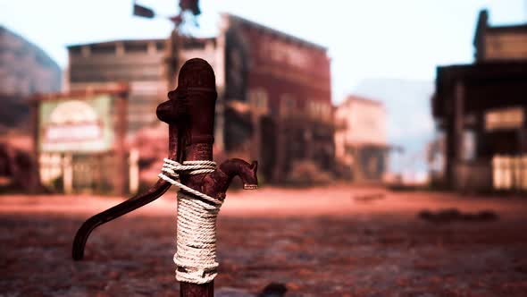 Old Rusted Water Pump in Wild West Town alt