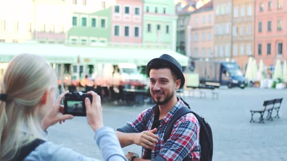 Tourists Making Photos with Photo Camera on Historical Market Square