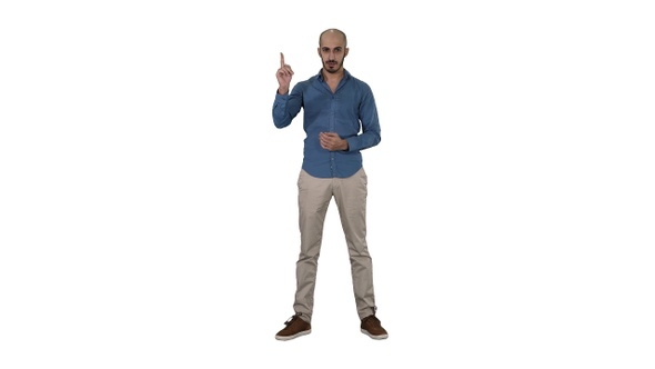 Arabic man in casual making attention gesture finger up