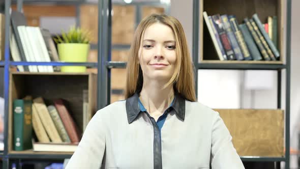 Agree, Woman Gesture of Yes, Shaking Head, Indoor Office