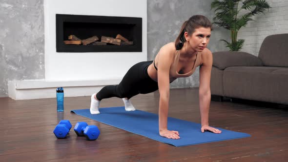 Strong Fit Woman in Sportswear Doing Plank Exercise Workout on Fitness Yoga Mat