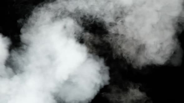 Water Vapor. Slow Motion 240Fps. Jet of Steam Under Pressure on Black Background