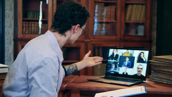 Library with a Male Teaching an Internet Class in It