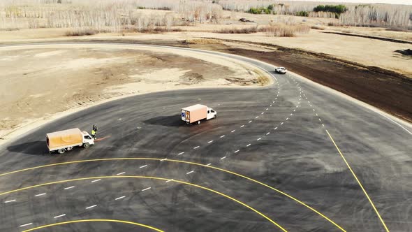 Aerial View of Pickup Truck That Drives Along Track of Proving Ground