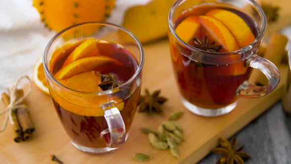 Glasses of Hot Mulled Wine with Orange and Spices 38