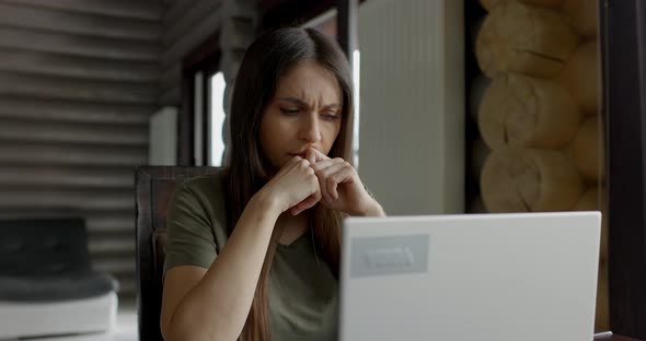 Stressed Businesswoman Working on Computer Feeling Tired