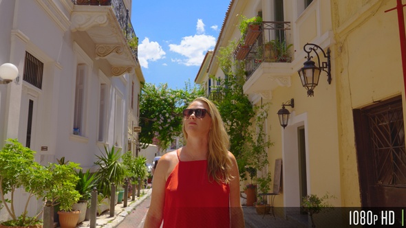 Caucasian Tourist Exploring a Narrow European City Street in Slow Motion