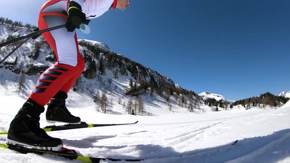 Super Slow Motion Cross Country Skier Skating on Ski Run