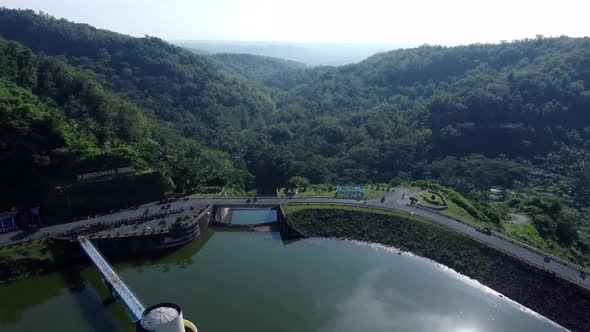 Aerial view of a calm morning atmosphere in an artificial lake or reservoir in Yogyakarta, Indonesia