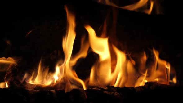 Bonefire, Fire flames in campfire, campsite at Masai Mara Park, Kenya, slow motion