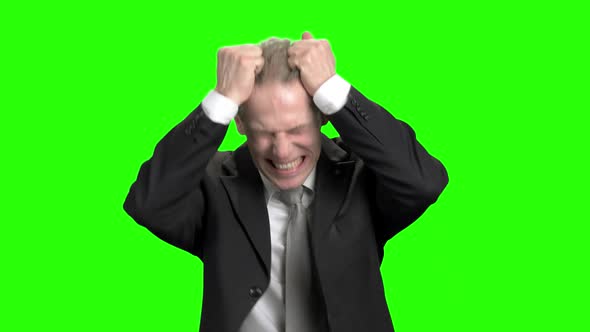 Extreme Angry Businessman Pulling Hair and Screaming