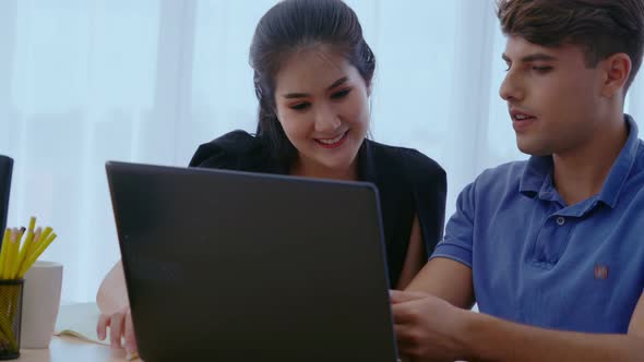 Creative Business People Group Having Conversation at Office Desk in Workplace