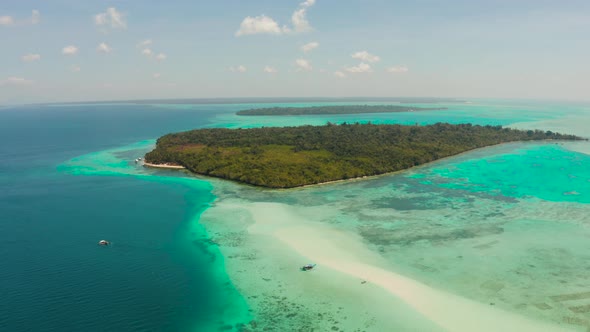 Sandy Beach in the Lagoon with Turquoise Water