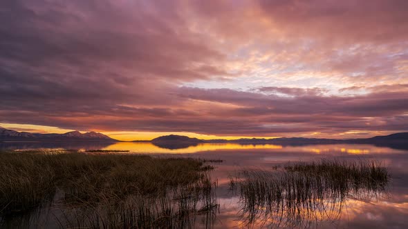 Colorful sunset timelapse over Utah Lake as the sky is on fire