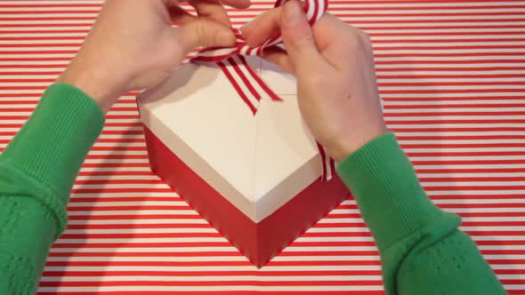 Christmas present being wrapped