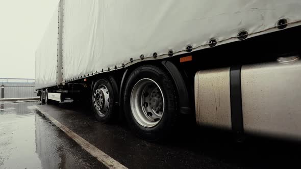 Truck Drives Through Logistics Center