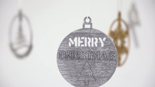 Silver ornament with Merry Christmas inscription