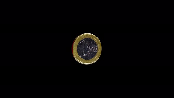 Shiny One Euro Coin with Ribbed Side on Black Background